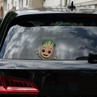 Baby Groot decal on a car window with a cityscape background