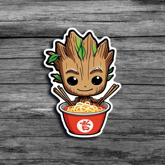 A sticker of Baby Groot sitting in a red bowl of ramen