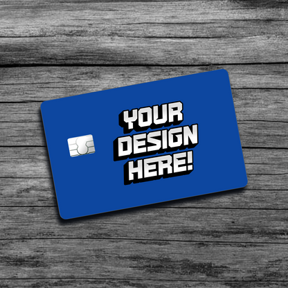 A picture of a blue personalized credit card skin that says "Your Design Here", with a small chip on the left side