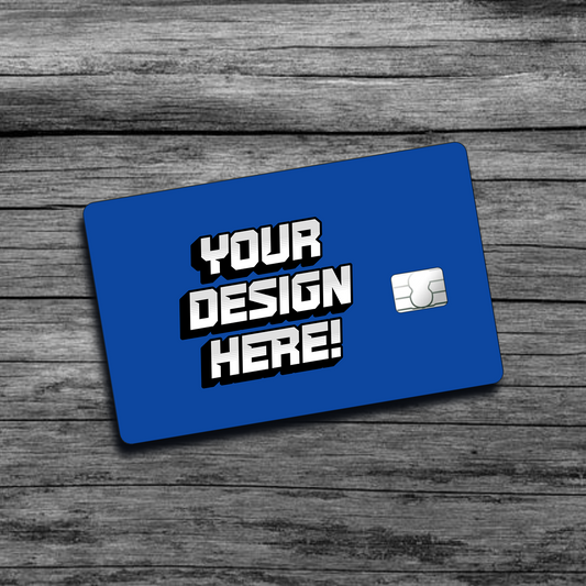 A picture of a blue personalized credit card skin that says "Your Design Here", with a small chip on the right side