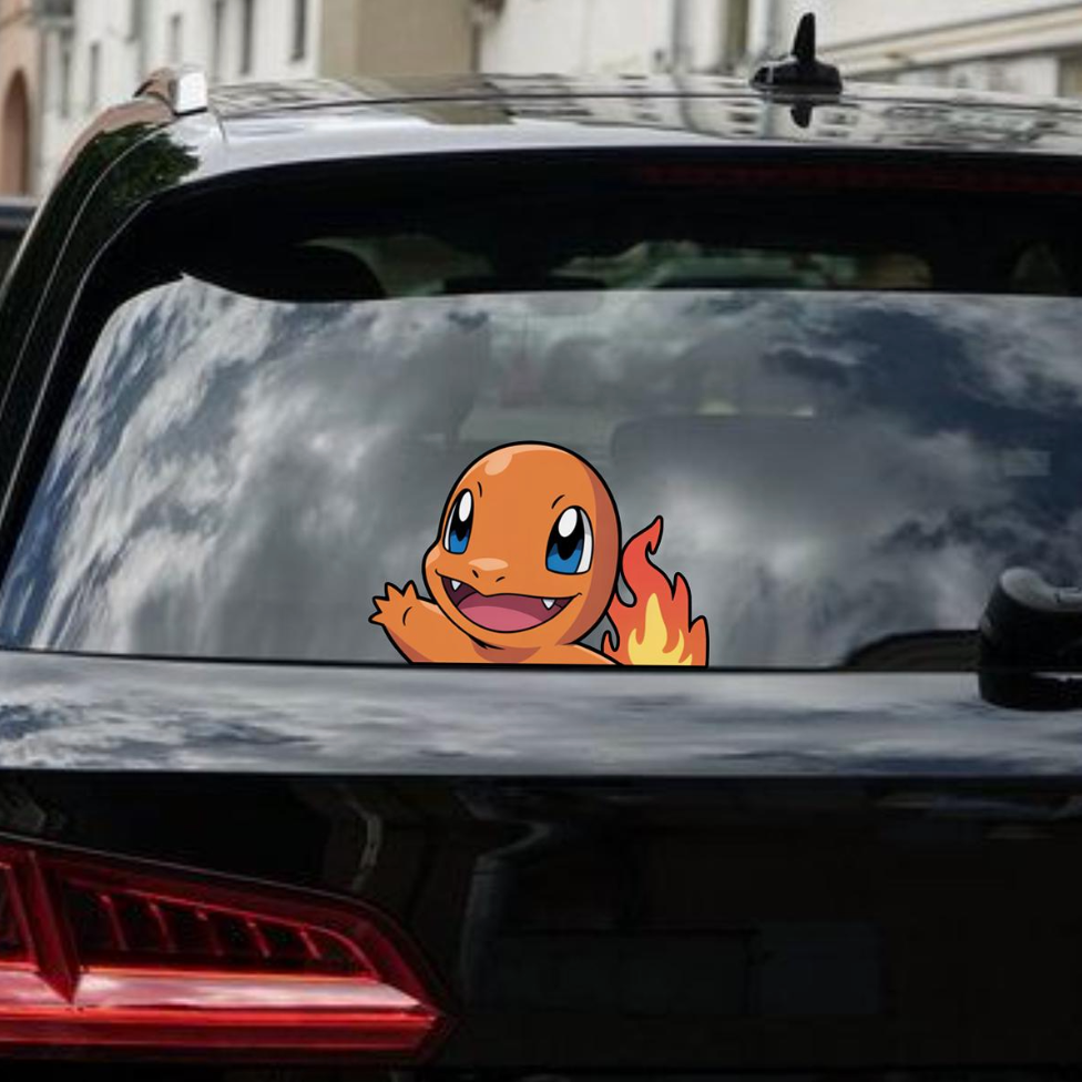 Charmander decal on a car window with a cityscape background