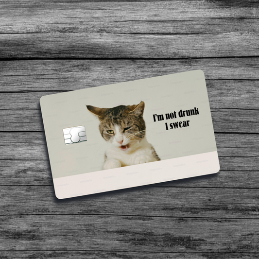 A credit card skin featuring a tipsy-looking cat with half-closed eyes and a relaxed, sleepy expression, giving a humorous, disoriented vibe.