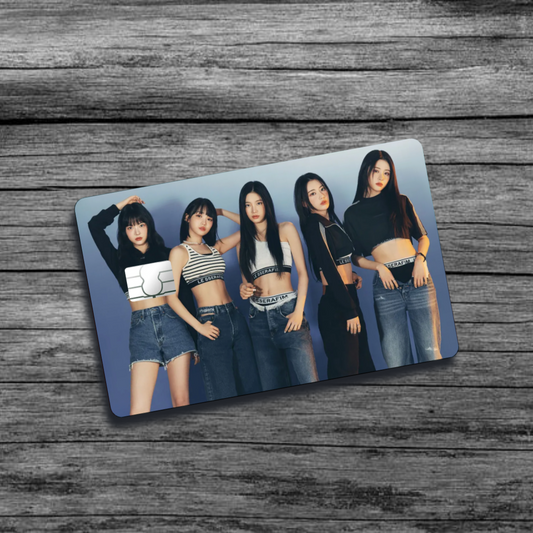 A credit card skin featuring K-Pop group Le Sserafim, five stylish women wearing jean clothing and crop tops, set against a blue-ish gray background.
