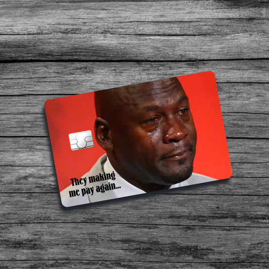 A credit card skin featuring the MJ Crying meme: a close-up of Michael Jordan's emotional face, capturing his tears during a poignant moment.