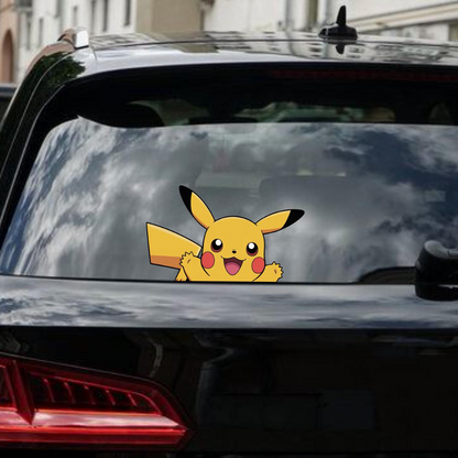 Yellow Pikachu decal on a car window with a cityscape background