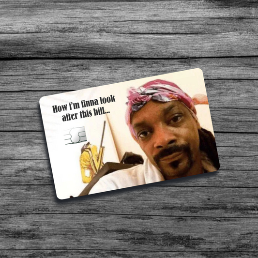 A credit card skin featuring Snoop Dogg in a head wrap with a serious expression, embodying a "looking poor" meme, adding a humorous touch.