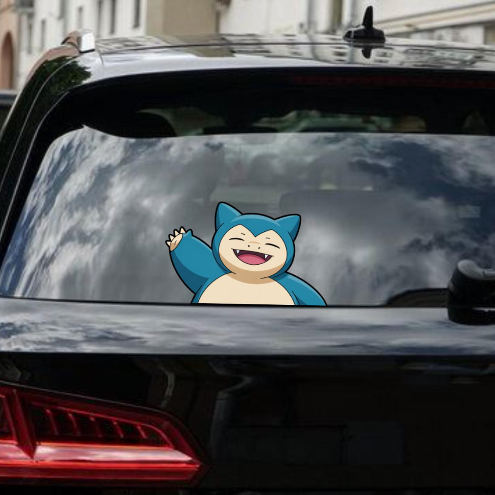 Snorlax decal on a car window with a cityscape background