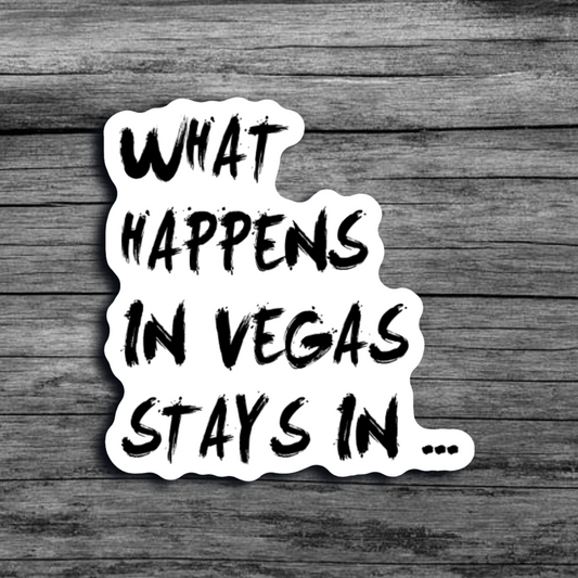 A white sticker with black font that says "What Happens in Vegas Stays In..."